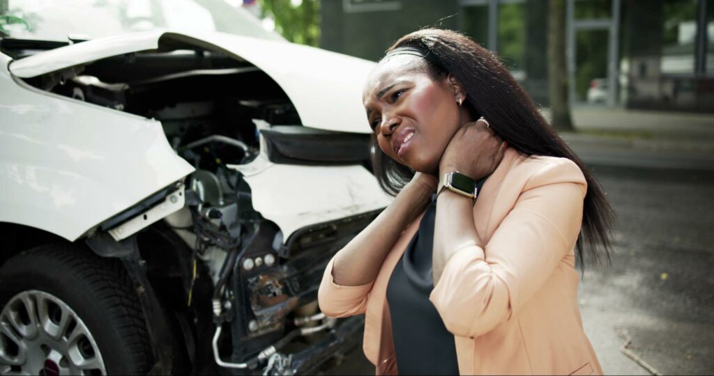 greenville-woman-rubbing-neck-after-car-accident