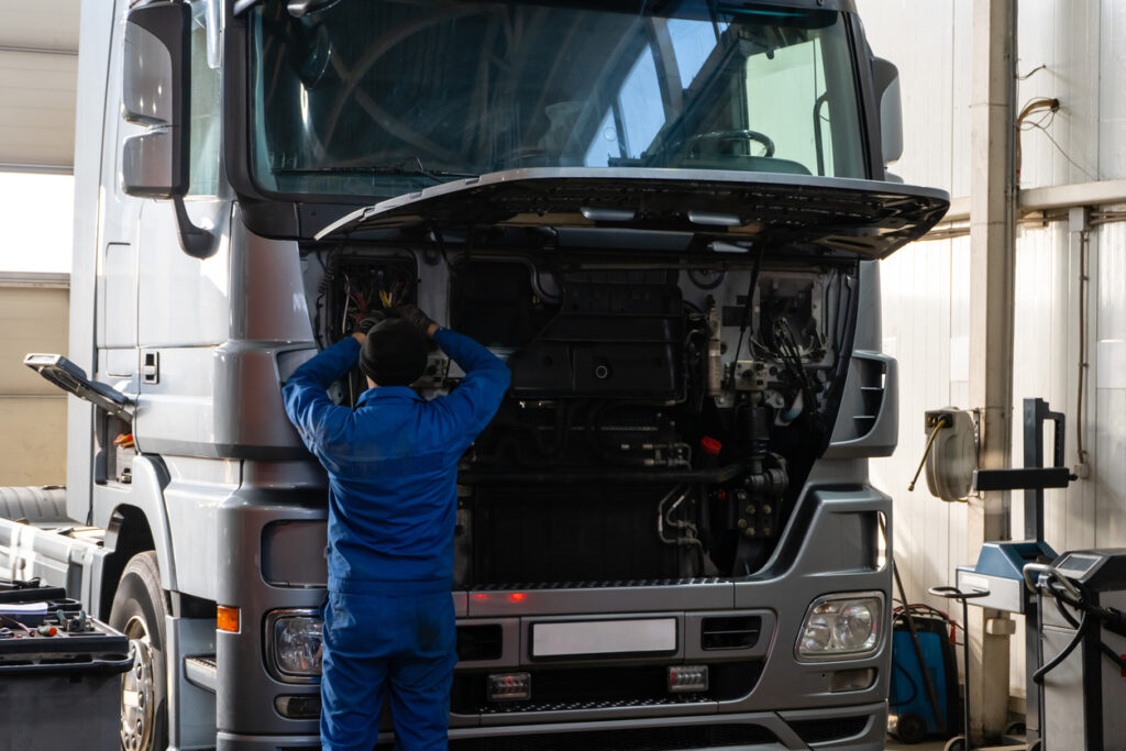 truck-being-maintenanced-inside-repair-shop