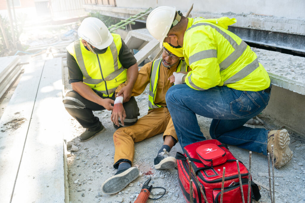 workers-helping-injured-construction-worker-in-SC